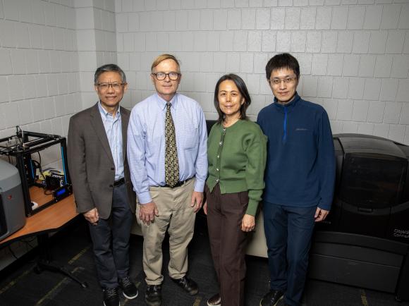 A photo of some of the researchers leading the project written about. 