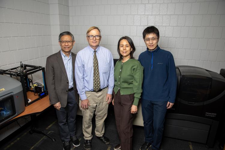 A photo of some of the researchers leading the project written about. 